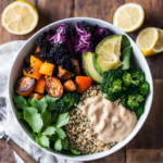 Bowl de quinoa aux légumes rôtis et sauce tahini citronnée